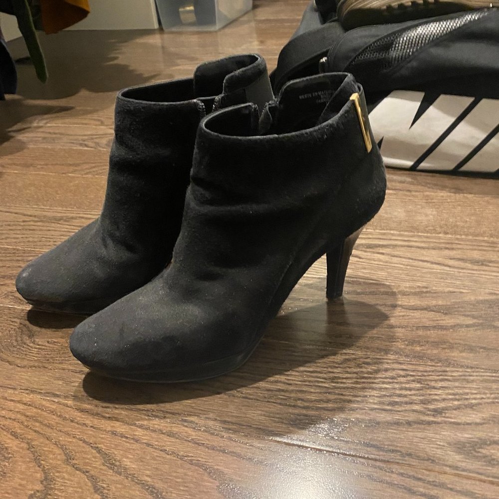 Black booties with gold detail